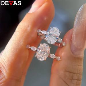 OEVAS 오벌 컷 1캐럿 2캐럿 풀 D 컬러 모이사나이트 다이아몬드 반지 여성용 18K 금도금 S925 실버 웨딩 참 파인 주얼리
