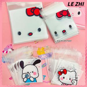Kawaii 100PCS 헬로 키티 Mymelody 귀여운 OPP 투명 포장 가방 캔디 가방 자체 접착 만화 인쇄 DIY 선물 과자 가방