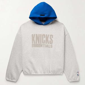 25 FW 피어오브갓 에센셜 X NBA 뉴욕 닉스 블루 후드 스웨트셔츠 라이트그레이 192AL246301F