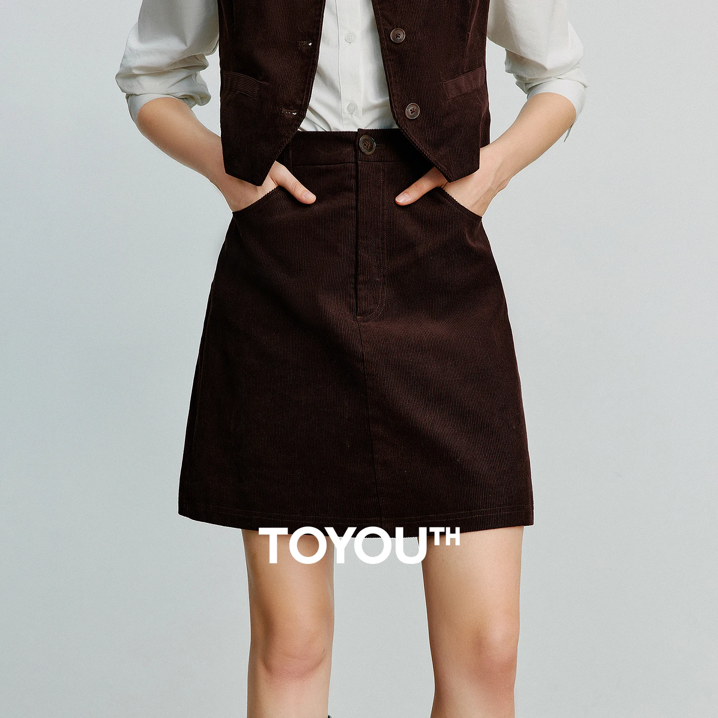 토유스 여성 미디 스커트 2025 가을 신상 레트로 코듀로이 밴딩 허리 순면 A라인 미니스커트