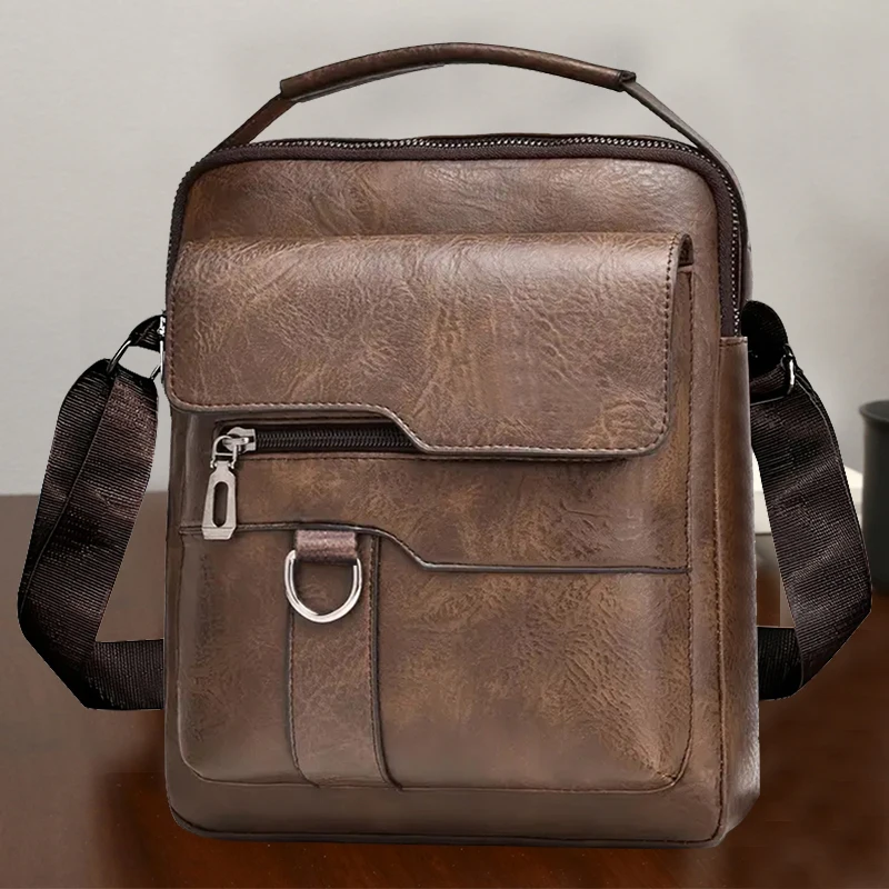 남성과 여성을 위한 중립적인 스타일의 숄더백, 비즈니스 여행 및 업무에 적합한 Pu 단색 크로스바디 백.