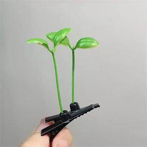 귀여운 유물 머리에 풀이 자라는 재미있는 작은 콩나물 풀 머리핀이 돋아나는 귀여운 콩나물 클립