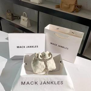 맥 잭클스 천연 가죽 버킷백 여성용 크로스바디 체인 스트랩 여름 2025 미니 스타일 부드러운 원형 단색