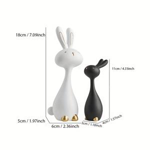 TEMU 2개의 애니메이션에서 영감을 받은 수지 토끼 조각상 세트, 검은색과 흰색 토끼 조각상은 실내 장식, 실내 사용, 크리스마스, 할로윈, 부활절, 하누카, 추수감사절에 이상적입니다. 모든 경우에 적합한 매력적인 선물입니다.