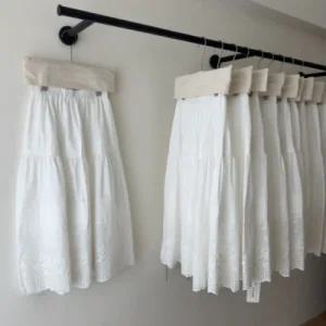 보니제이 / 펀칭 레이스 캉캉 밴딩 볼륨 플레어 화이트 롱스커트