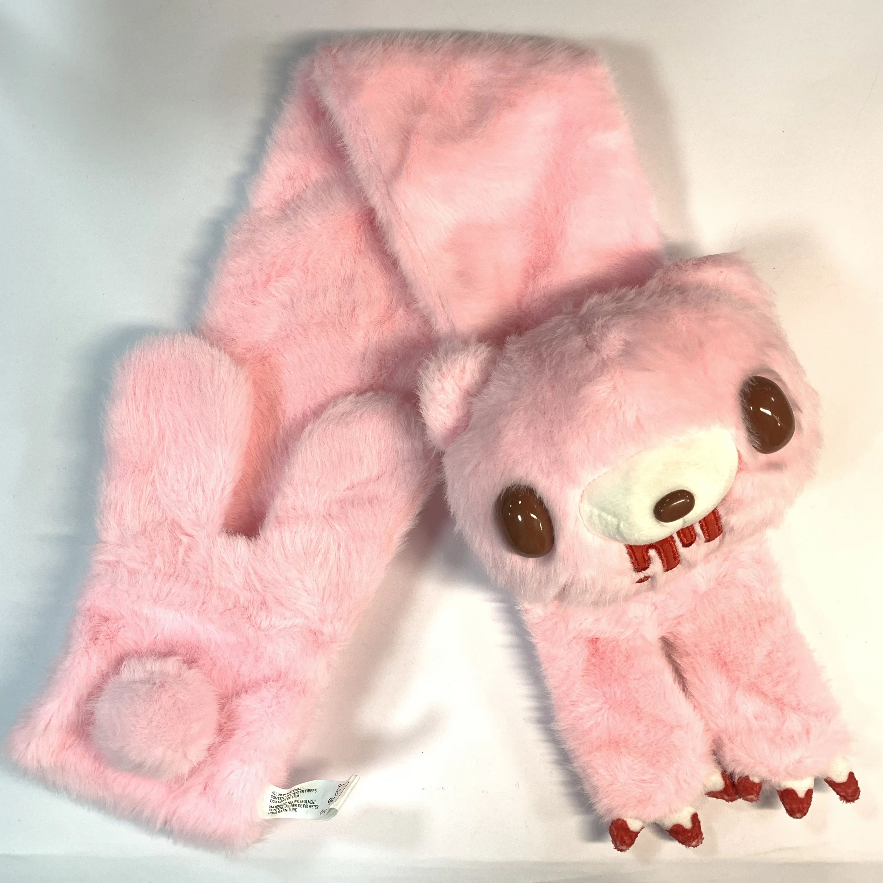 핑크 Gloomy Bear 플러시 스카프. 부드러운 인조 모피, 상징적인 곰 얼굴. 팬들을 위한 따뜻하고 스타일리시합니다.