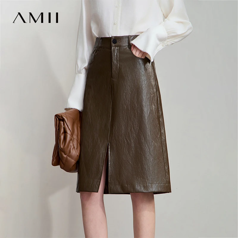 AMII 미니멀리스트 PU 레더 스커트 여성용 2025 아메리칸 레트로 무릎 길이 스커트 솔리드 베이직 비즈니스 여성 의류 12553014