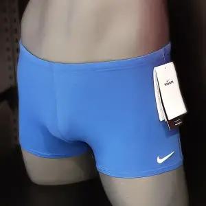 [롯데백화점]나이키 남성 솔리드 스퀘어레그 NESSA002-494