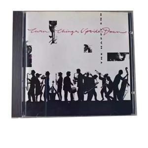 CD 더 해피 엔드 턴 씽스 업사이드 다운 이 앨범은 모던 재즈 빅 밴드 스타일에 속하며, 전통적인 스윙과의 융합을 특징으로 합니다.