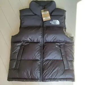 노스페이스 패딩 조끼 눕시 온볼 베스트 블랙