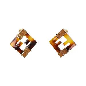 포에버 FF 로고 귀걸이 8AK946 ALI0 F1BDE