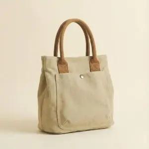 [라일리] Rly 리부 코튼캔버스 토드백  44240553)