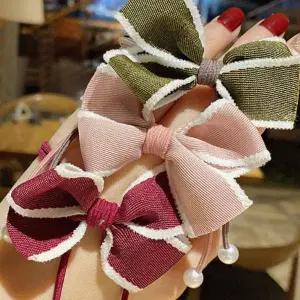 [골드스마일]자국안남는헤어밴드 리본과 진주 여성스러운 디자인 어린이끈