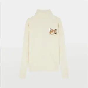 [메종키츠네]폭스 헤드 인타르시아 남녀공용 하이넥 니트 JM00560KT1063 P700 150468394