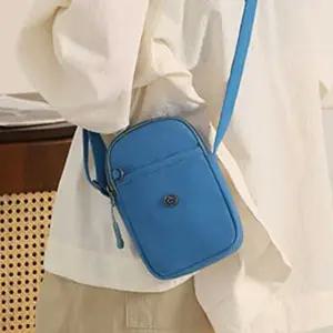 가벼운 나일론 방수 소재 미니 크로스백 핸드폰 수납 (WFK5UE1)