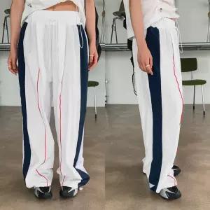 여자 나일론 옆줄 트랙 바람막이 밴딩 팬츠