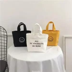 스마일 에코백 미니 캔버스백 도시락 피크닉 보조 가방 (WFK6LSO)