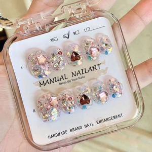 TEMU 사랑스러운 핑크 공주 테마 탈착식 핸드메이드 네일 아트, 블러쉬 리본이 있는 짧은 인조 네일로 구성되어 있습니다.