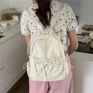 [다잇템] 여자 슈슈핸들 프레피 리본 드로우코드 멀티포켓 키치 백팩