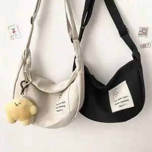 남녀공용 캐주얼 라운드 크로스백 학생 커플 가방 (KYR-WF367AD)