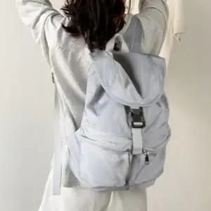 남녀공용 심플 데일리 버클 스트랩 가방 지퍼 포켓 백팩