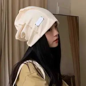 겨울비니모자 여자 해외 여행 나들이 룩 메탈 장식 롱 비니 모자