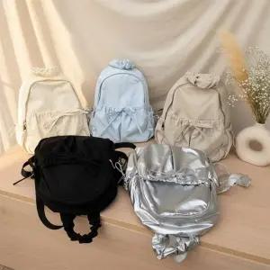 [다잇템] 여학생 슈슈핸들 키치리본 멀티포켓 드로우코드 백팩