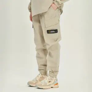 [내셔널지오그래픽]내셔널지오그래픽 N231UPT990 우븐 트레이닝 조거 팬츠 OAK BEIGE