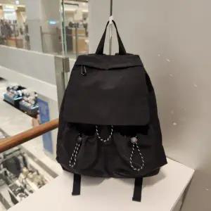 [발리스윗](김해점)26나일론스트링플립백팩SQ4WAB04