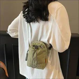 미니 크로스백 나일론 스트링 레터링 캐주얼 여성 보조가방 WFK6LAA