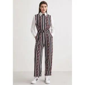 [아웃도어스/맥케이슨]여성 시그니처 씨슬 점프수트 버건디 MDW3JO696BUR