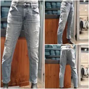 인기 남성 슬림배기 핏 연청 데미지 청바지_US