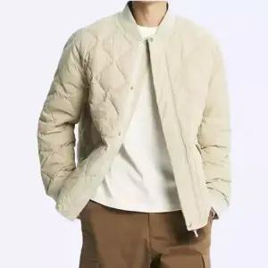 뉴발란스 매장정품 UNI 24/7 퀼팅 경량다운 자켓 베이지 (NBNPD41903_35)