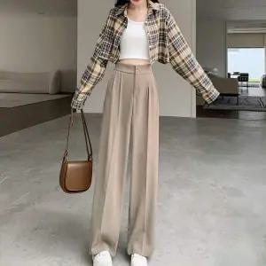 여성 OS40NP61 베이직 투버튼 뒷밴딩 슬랙스 와이드핏 롱팬츠