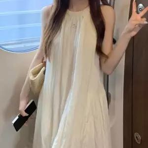 여성 꼬임 홀터넥 가볍고 시원한 민소매 롱 원피스데일리 캐주얼 루즈핏 반팔 휴양지룩 휴가 나시 여름