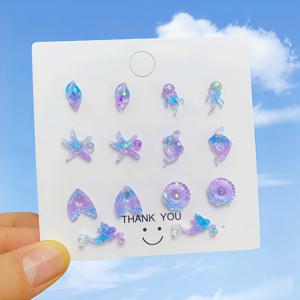 TEMU 14개/7쌍 미니 로맨틱 오션 스타일 귀걸이 세트 - 야광 레진 소재, 약간 야광 효과, 저자극성 귀걸이 디자인, 가볍고 편안한 착용감, 데일리 데이트 및 휴가에 적합, 여성과 청소년을 위한 저자극성 귀걸이, 미니 보관함 포함, 휴일 선물, 정교하고 현실적인 해양 동물 디자인 - 조개, , 인어, 해파리, 돌고래