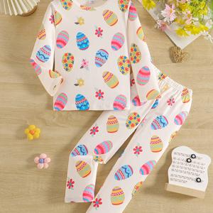 TEMU 새로운 시즌 여아용 잠옷 세트. 부활절 테마 만화 달걀 프린트가 특징이며, 꽃무늬 칼라와 캐주얼 스타일의 투피스 의상으로 아이들에게 완벽합니다. 부활절 선물로도 이상적입니다.