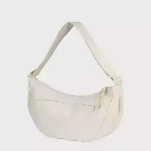 잔스포츠 jansport 언페이즈드 크로스바디 라지 SOFT NYLON MOON FLOWER