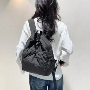 [신상오픈런]여성용 심플 나일론 스트링 포켓 경량 캐주얼 백팩 (37000849)