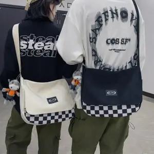 체크 크로스백 포인트 앞덥개 무늬 남여공용 데일리