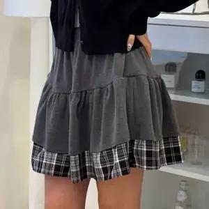 [아이우먼] 캉캉밴딩체크단스커트 YPX233M602 빅사이즈