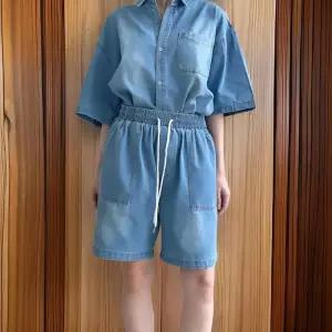 [신상오픈런]여성 여름 캠퍼스 스타일 5부 대형 주머니 워싱 청바지 (32776944)