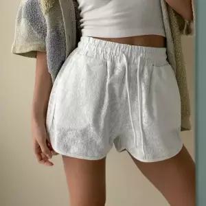 [신상오픈런]여성 플로럴 자가드 여름 핫팬츠 끈 조절 반바지 (33265382)