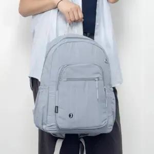 [옷자락]남녀공용 경량 나일론 지퍼포켓 백팩