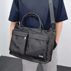 [옷자락]남자 캐주얼 경량 노트북수납 무지 블랙 토트 크로스백