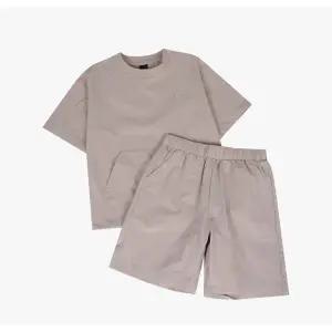 [롯데백화점]인디고뱅크키즈 드라이 스트레치 반팔 상하세트 IKJT25401