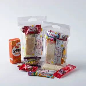 간식꾸러미 9종 음료포함 손잡이 지퍼백 간식세트 학교 유치원 학원 기업 기관 관공서 어린이날 단체 행사 과자선물세트