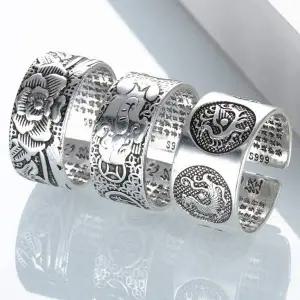 [오너클랜]TBZ 반지 빈티지 S999 각인 은도금 부처님 남여공용 129자