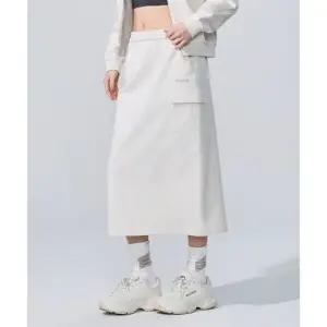 디스커버리익스페디션 여성 테크 니트 트레이닝 카고 스커트 MIVORY 469155