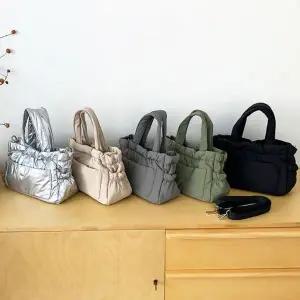 WL 여성 데일리 패딩 크로스 토드 백 손목 가방 손목가방